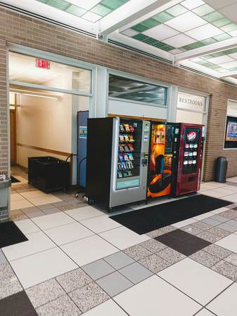 Dixie Narco 276E compact 7-select drink vending machine